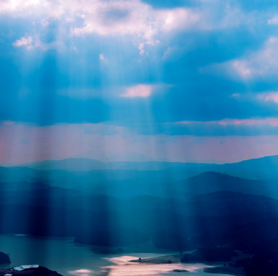 Calm Body Of Water Under Sun Rays photo