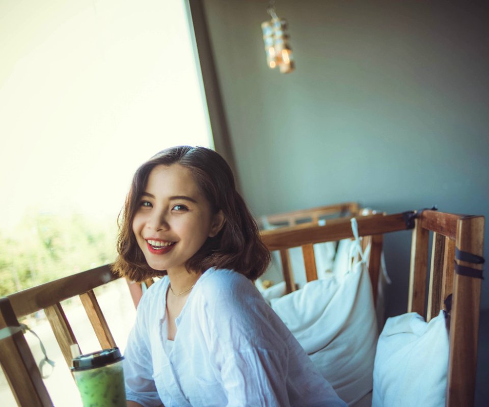 Woman In White Long-sleeved Top