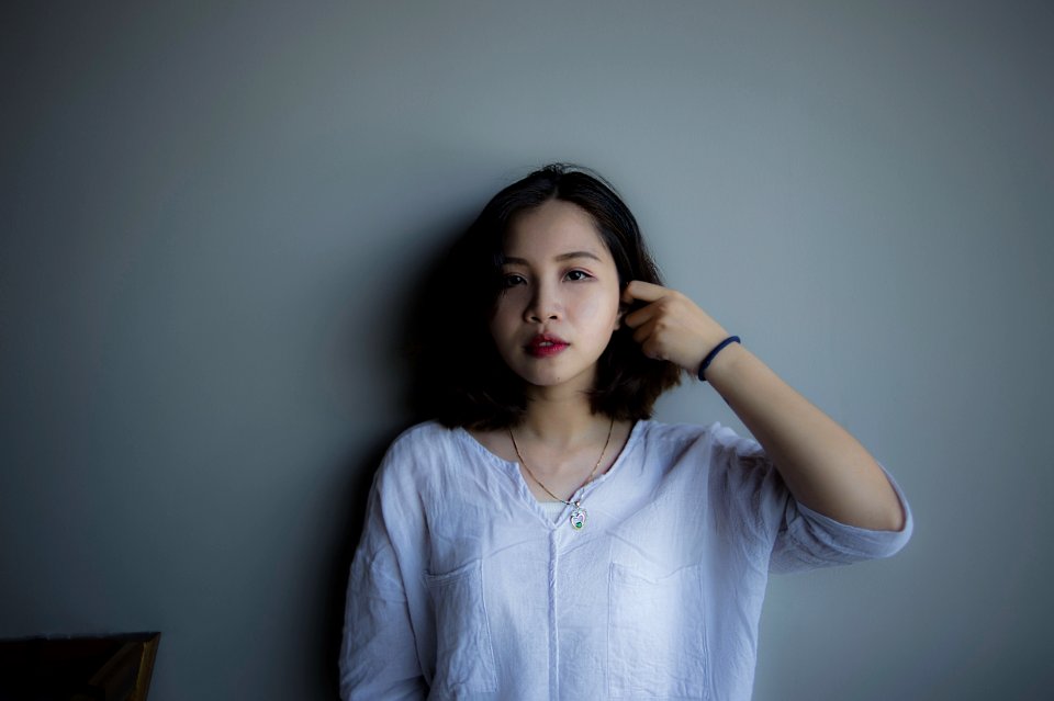 Woman Wearing Blue Long-sleeved Shirt
