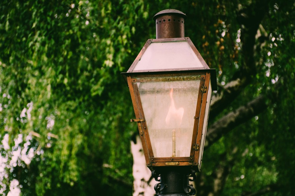 Lighted Brown Metal Post Lamp