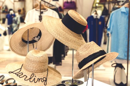 Four Brown Straw Hats Display photo