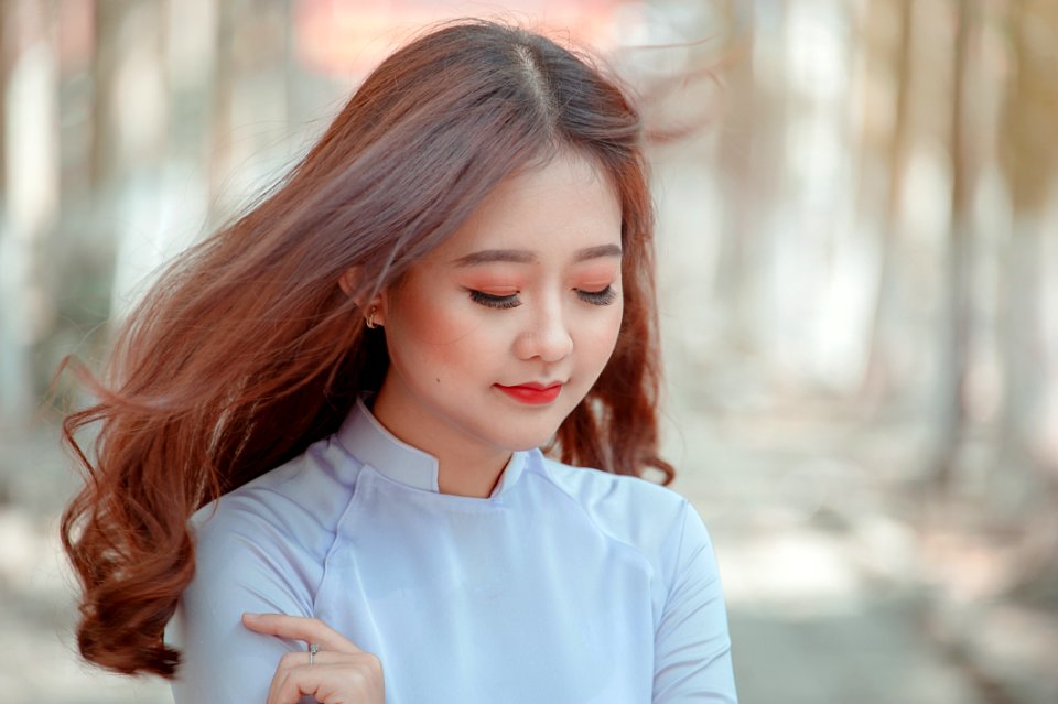 Photo Of Woman Wearing White Top