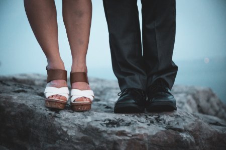 Closeup Photo Of Two Persons Legs photo