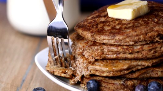 Slicing Pancakes With Fork photo