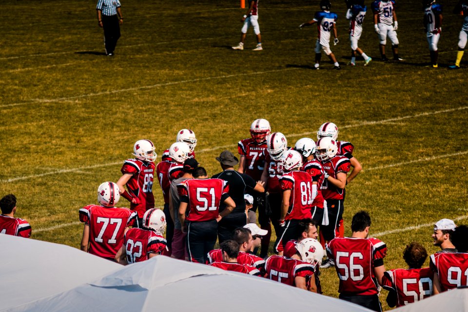 Football Team Wearing Red Jersey