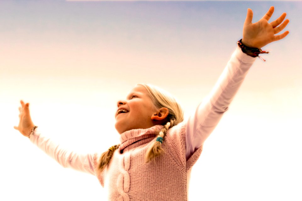 Blonde Haired Girl Wearing Pink Sweater