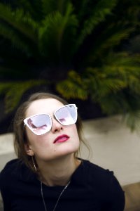 Photo Of Woman Wearing Black Top And Sunglasses photo