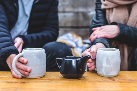 Man And Woman Having A Tea Conversation photo