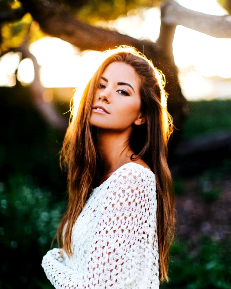 Photo Of Woman Wearing White Crochet Cardigan