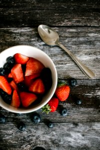 Photography Of Strawberries And Blueberries On Bowl photo