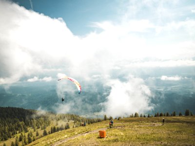 Person Riding On Parachute