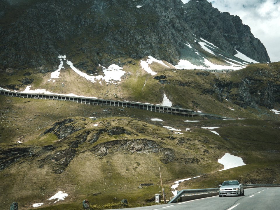 Silver Car On Road Near Mountain At Daytime