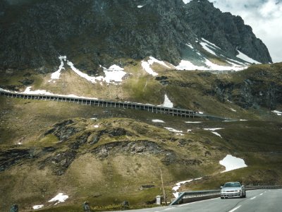 Silver Car On Road Near Mountain At Daytime