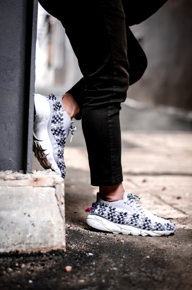 Person Wears Pair Of Gray Low-top Sneakers