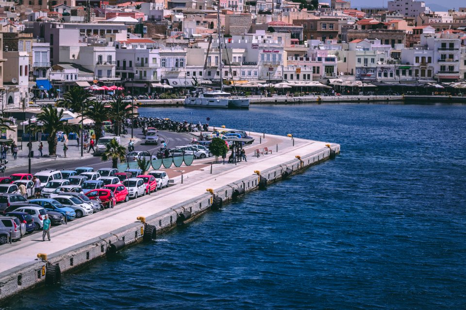 Cars Parked Near Body Of Water
