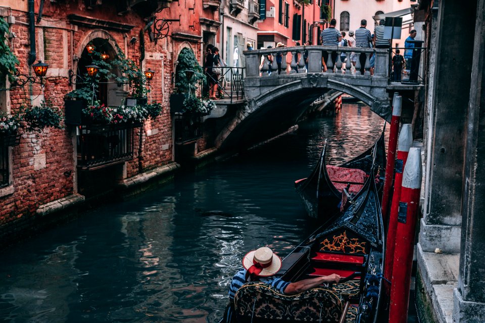 Photo Of Man Riding Canoe