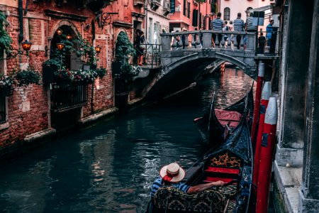 Photo Of Man Riding Canoe