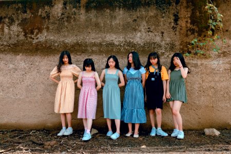 Six Girls Leaning On Wall photo