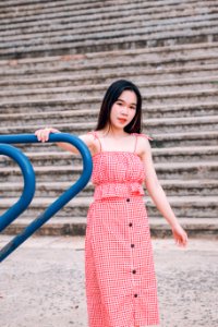 Woman In Red And White Spaghetti Strap Dress photo