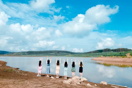 Six Women Raising Their Both Hands photo