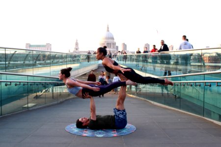 Man Lifted Two Women In Middle Of Pathway photo