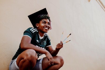 Woman Wearing Green And White Adidas Jersey Shirt