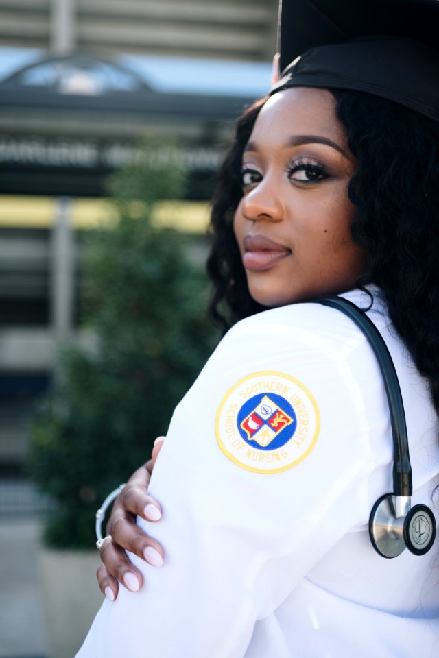 Woman Wearing White Long-sleeved Shirt And Stethoscope