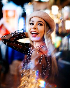 Woman In Black Sheer Top Smilling