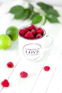 Close-Up Photography Of Raspberries On Cup