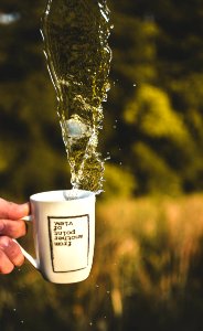 Time Lapse Photography Of Water In Cup photo