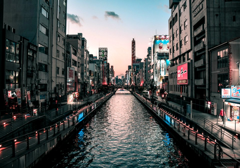 River With High-rise Buildings On The Sides