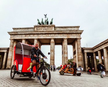 Man In Black Hoodie Riding Trike