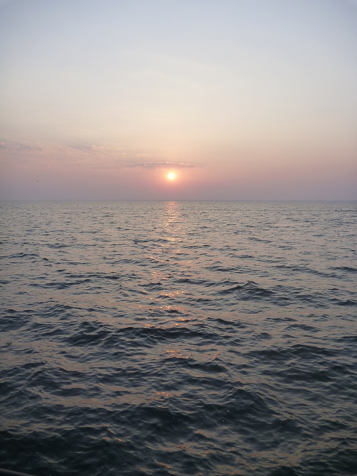 Sunset sea clouds photo