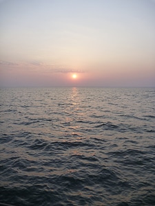 Sunset sea clouds photo