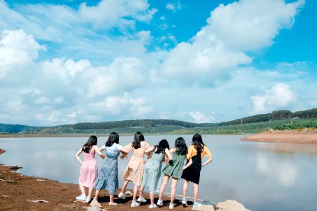Six Women Standing Near Body Of Water