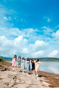 Photo Of Six Women On Brown Soil photo