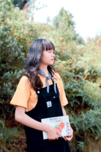 Woman Holding Book