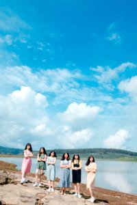 Six Women Near Body Of Water