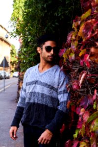 Photography Of A Guy Near Leaves