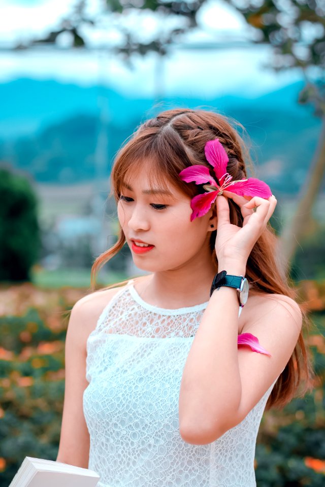 Brown Haired Woman In White Sleeveless Top In Bokeh Photography