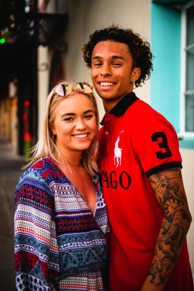 Man In Red And Black Polo Shirt