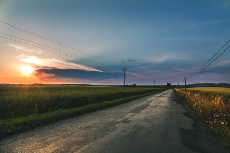 Grey Empty Road Between Fields