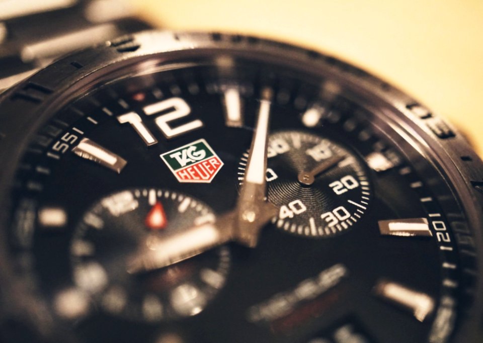 Round Black Tag Heuer Chronograph Watch photo