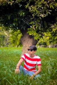 Man Wearing Sunglasses Near Tree photo