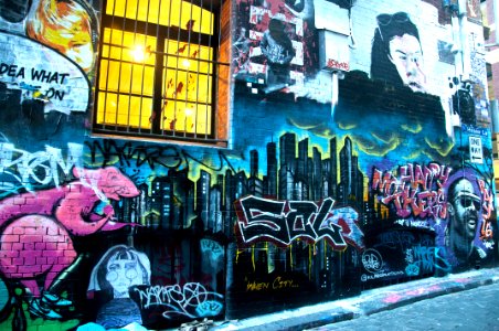 Photography Of Graffiti On Brickwall photo