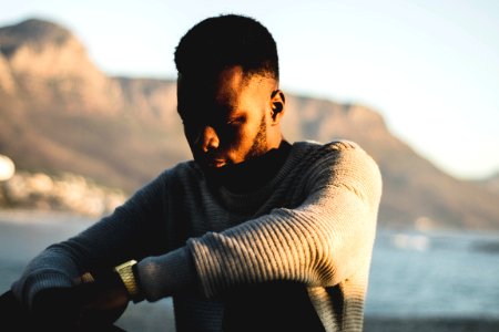 Man Wearing Gray Sweater In Selective Focus Photography photo