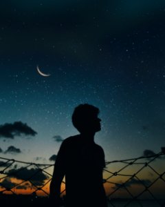 Silhouette Of Man During Nighttime photo