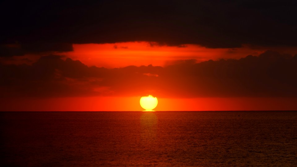 Silhouette Of Clouds During Golden Hour Photograph photo