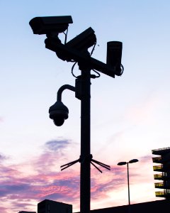 Black Lamp Post With Mounted Cameras photo