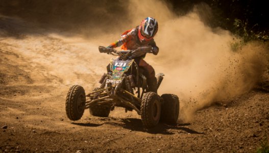 Person Riding On Black Atv Quad Bike